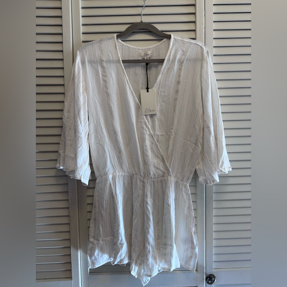 Elan Medium Cream with Gold Striped Romper. PTP 19”. Short inseam 3”.